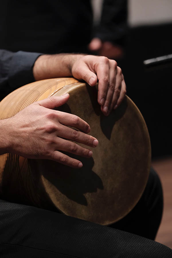 Photo of hands playing a drum by Sam Moqadam on Unsplash